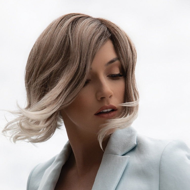 Short-length synthetic wig. This wavy ready-to-wear wig is a salon inspired bob with beach waves. This trendy bob has a new lace and front partial monofilament cap. Its lace front will give you a natural look with the partial monofilament base. Safi cap construction has adjustable tabs in the back nape area to allow a more comfortable fit. The result is a comfortable fit with a natural look that is both fashionable and easy to wear.