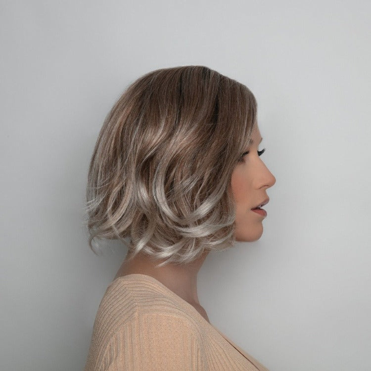 Short-length synthetic wig. This wavy ready-to-wear wig is a salon inspired bob with beach waves. This trendy bob has a new lace and front partial monofilament cap. Its lace front will give you a natural look with the partial monofilament base. Safi cap construction has adjustable tabs in the back nape area to allow a more comfortable fit. The result is a comfortable fit with a natural look that is both fashionable and easy to wear.