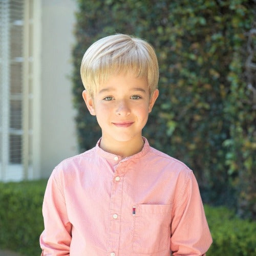 Synthetic childrens short unisex style wig with bangs. Lace front and lace part cap make this a realistic option. Shown in Creamy Toffee.