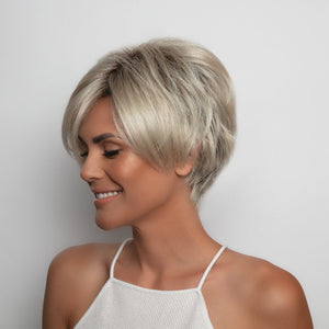 Short-length synthetic wig. This straight ready-to-wear wig is a classic cut with short layers featuring side swept fringe and tapered nape. Susanne is machine made with adjustable tabs in the back nape area to allow a more comfortable fit. The result is a comfortable fit with a natural look that is both fashionable and easy to wear.