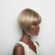 Load image into Gallery viewer, Short-length synthetic wig. This straight ready-to-wear wig is a sleek A-Line cut with full fringe.  Angie is machine made with adjustable tabs in the back nape area to allow a more comfortable fit. The result is a comfortable fit with a natural look that is both fashionable and easy to wear. Shown in Creamy Toffee-R
