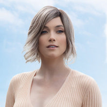 Load image into Gallery viewer, Short-length synthetic wig. This wavy ready-to-wear wig is a salon inspired bob with beach waves. This trendy bob has a new lace and front partial monofilament cap. Its lace front will give you a natural look with the partial monofilament base. Safi cap construction has adjustable tabs in the back nape area to allow a more comfortable fit. The result is a comfortable fit with a natural look that is both fashionable and easy to wear.
