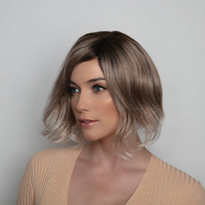 Short-length synthetic wig. This wavy ready-to-wear wig is a salon inspired bob with beach waves. This trendy bob has a new lace and front partial monofilament cap. Its lace front will give you a natural look with the partial monofilament base. Safi cap construction has adjustable tabs in the back nape area to allow a more comfortable fit. The result is a comfortable fit with a natural look that is both fashionable and easy to wear.